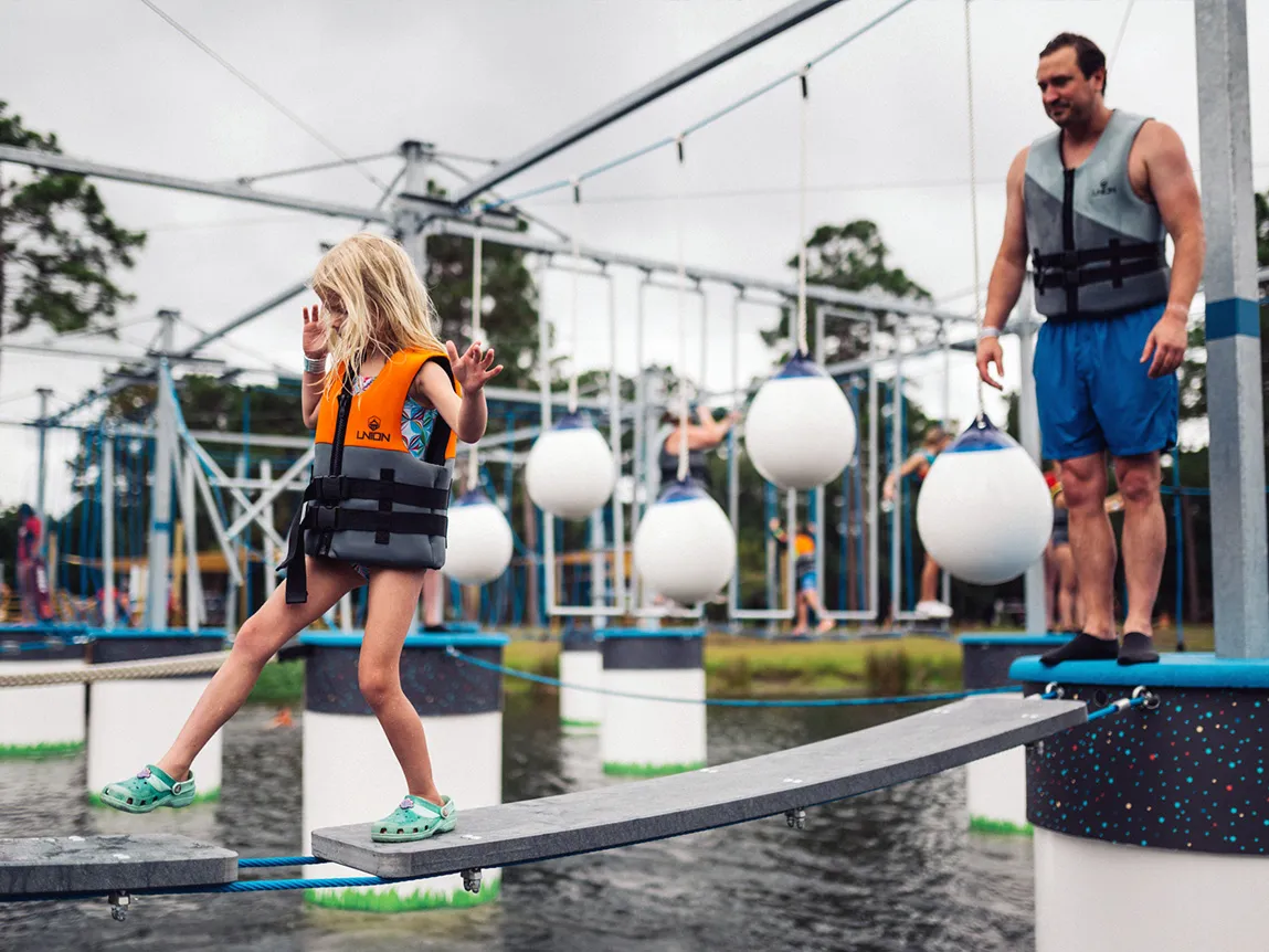 Epic zipline finish splashing into Trophy Lakes at Charleston Aqua Park