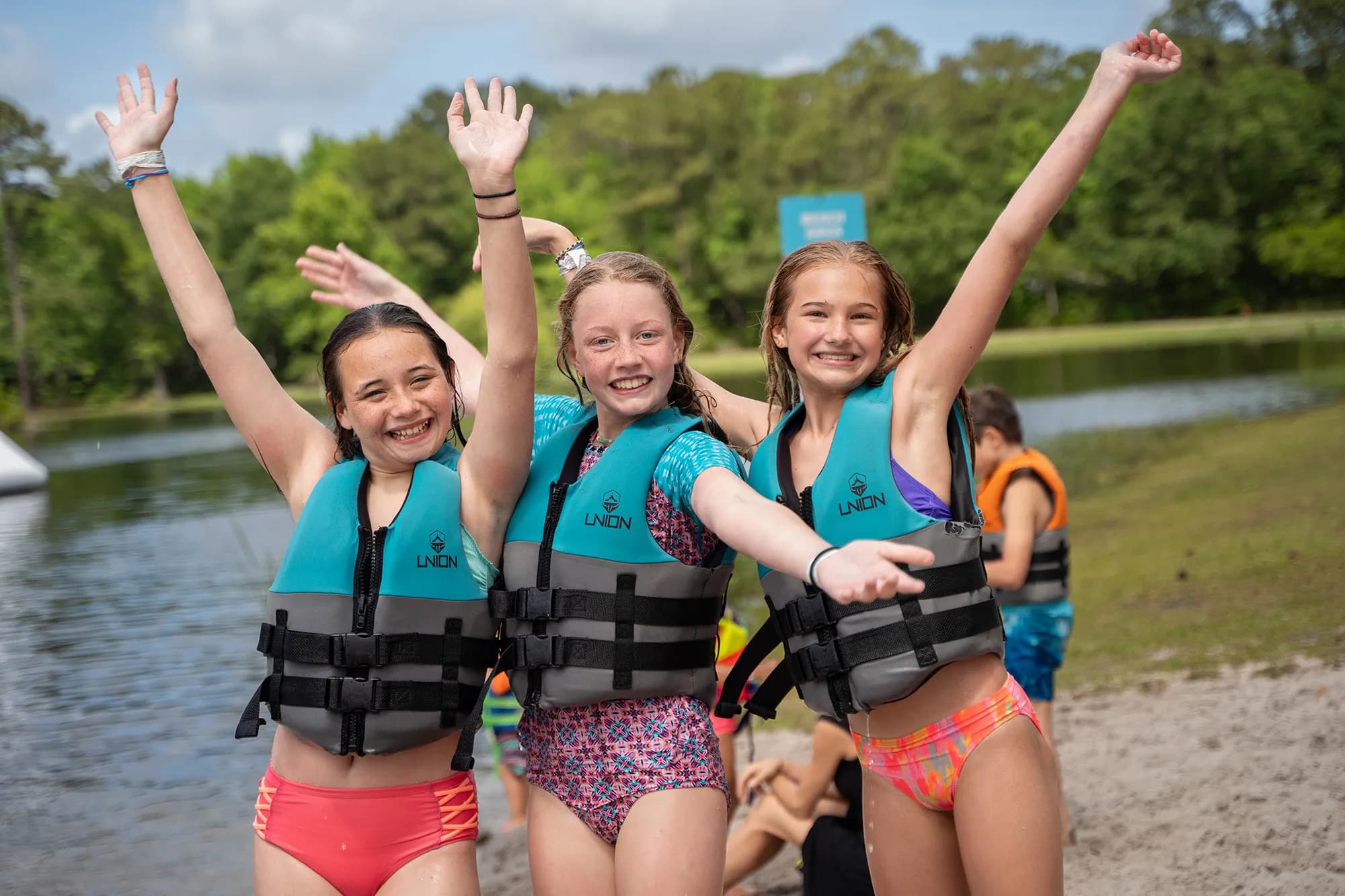 Kids having fun at Charleston Aqua Park summer camp water sports activities at Trophy Lakes Johns Island SC